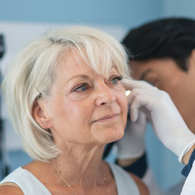 Woman being tested for hearing loss.